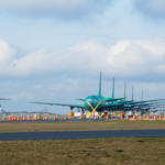 EVERETT, WASHINGTON, USA - JAN 26th, 2017: Brand new Boeing 787 Dreamliner with no engines and paintinnnng waiting to be completed and for a successful test flight at Snohomish County Airport or Paine Field. An old Boeing 727 in the background.