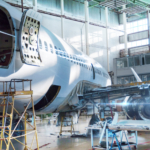 Passenger jet plane under maintenance in the hangar. Checking me