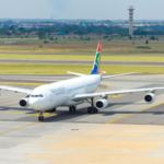 South African Airways Airbus A340 at O. R. Tambo airport. Airline in financial trouble without government aid. A340-300 aircraft registered as ZS-SXG.