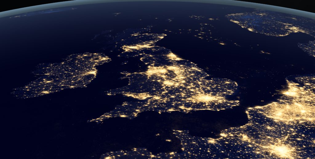 United Kingdom at night in the earth planet rotating from space