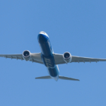 Boeing 777X tail N779XX on a test flight in Boeing corporate livery