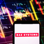 KONSKIE, POLAND - September 10, 2022: Smartphone displaying logo of BAE Systems company on stock exchange chart background