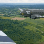 Lead D-Day aircraft flies over France again 80 years on