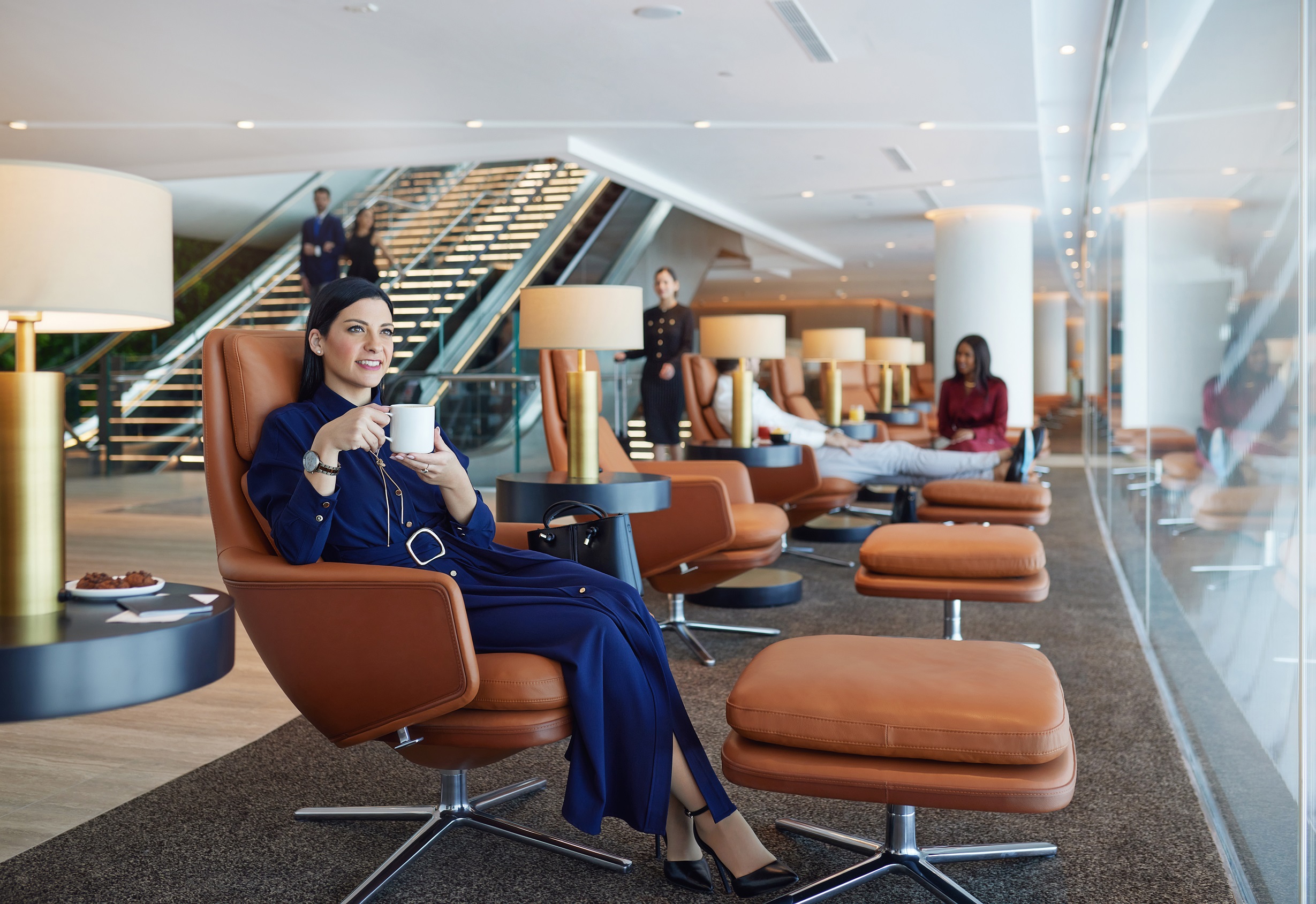 Terminal A - Lounge - Lady having tea/coffee