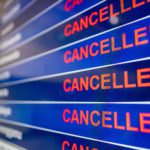 Cancelled flights board at airport due to the coronavirus