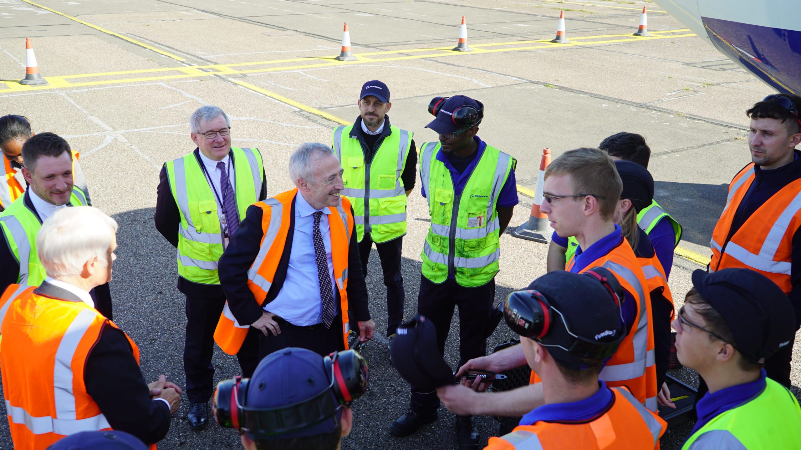 Sir-Martin-Donnelly-with-Boeing-apprentices-at-Cranfield-in-2019-scaled