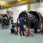 Technicians working on a LEAP-1A engine at ST Engineering's facility in Singapore 3