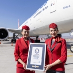 Turkish Airlines cabin crew with the Guinness World Record certificate