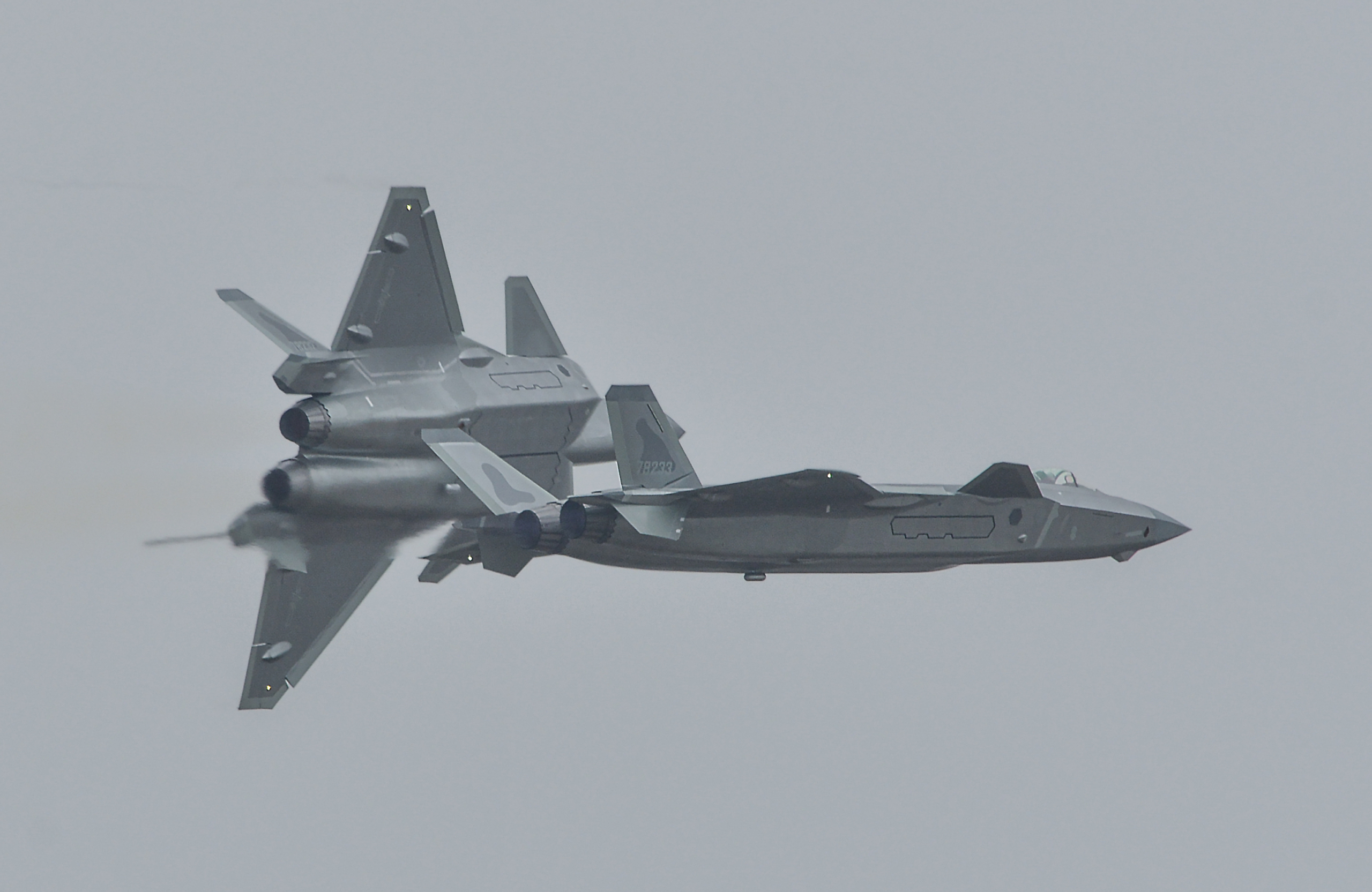 A pair of Chengdu J-20s flying
