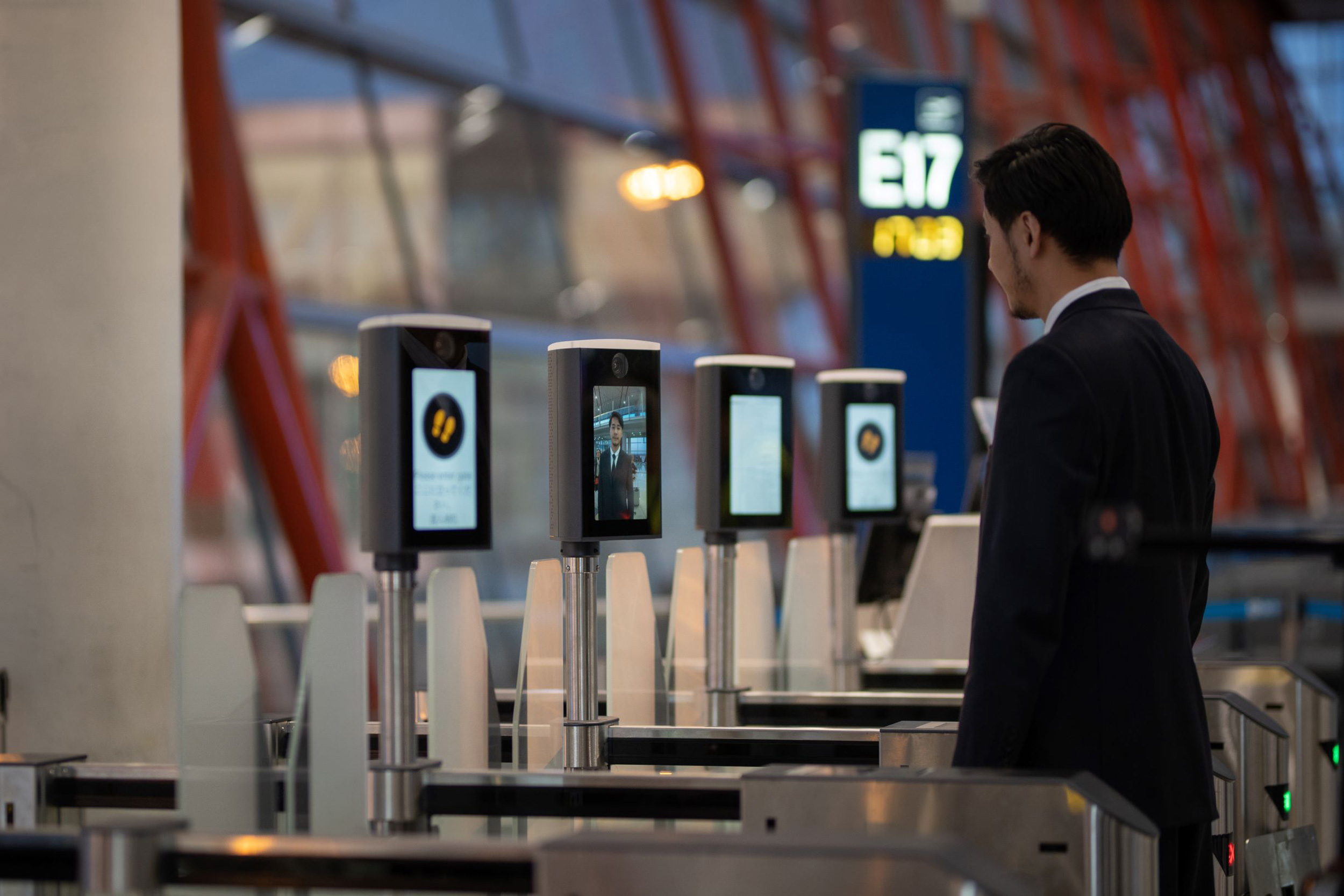 Passenger using biometric boarding.