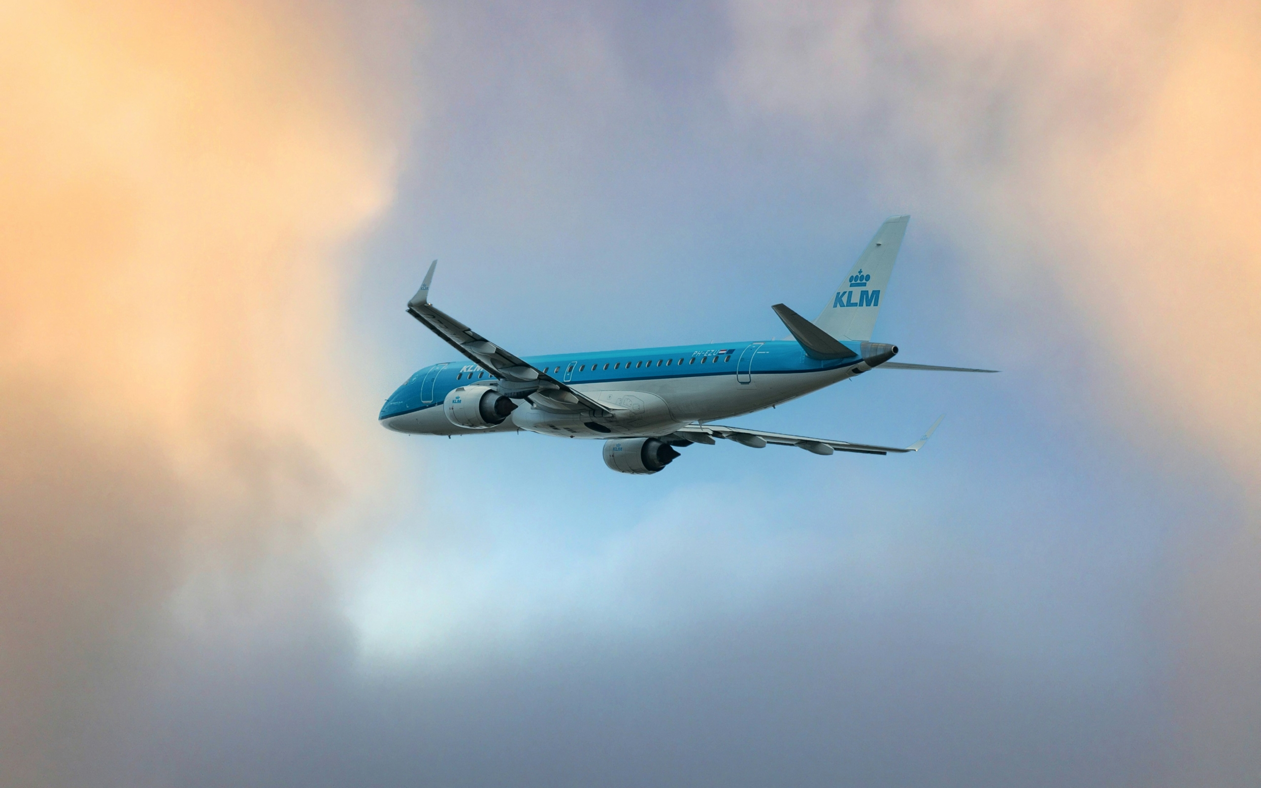 A KLM aircraft in a cloudy sky
