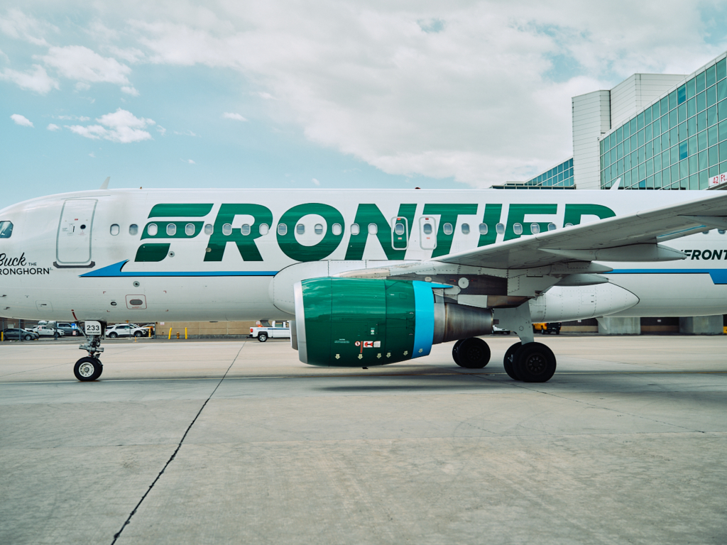 Frontier Airlines planes taxi at Denver International Airport in Denver, Colorado, Tuesday, June 14, 2022.