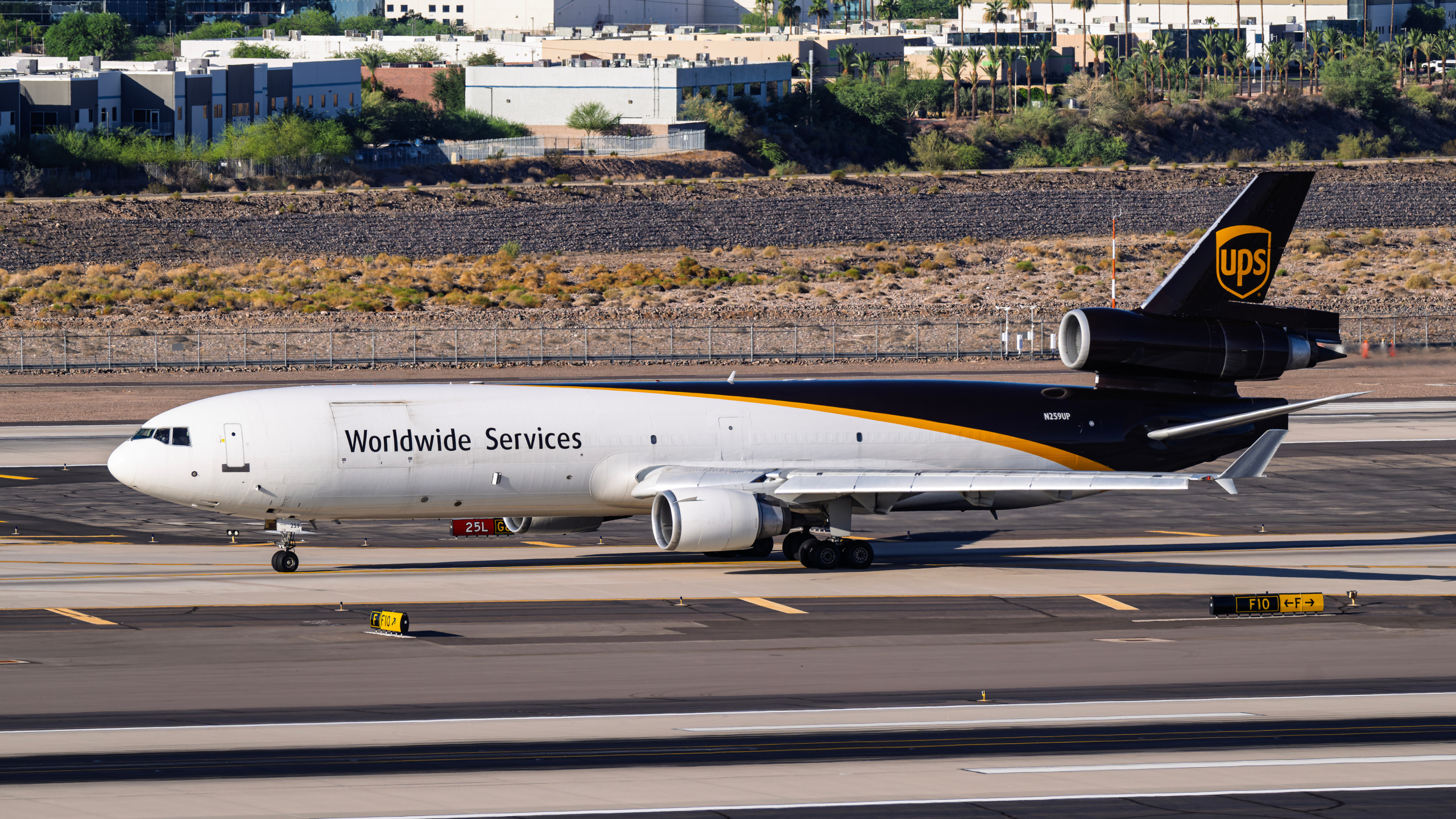 UPS McDonnell Douglas MD-11F N259UP departure from Phoenix Sky Harbor Intl. Airport.