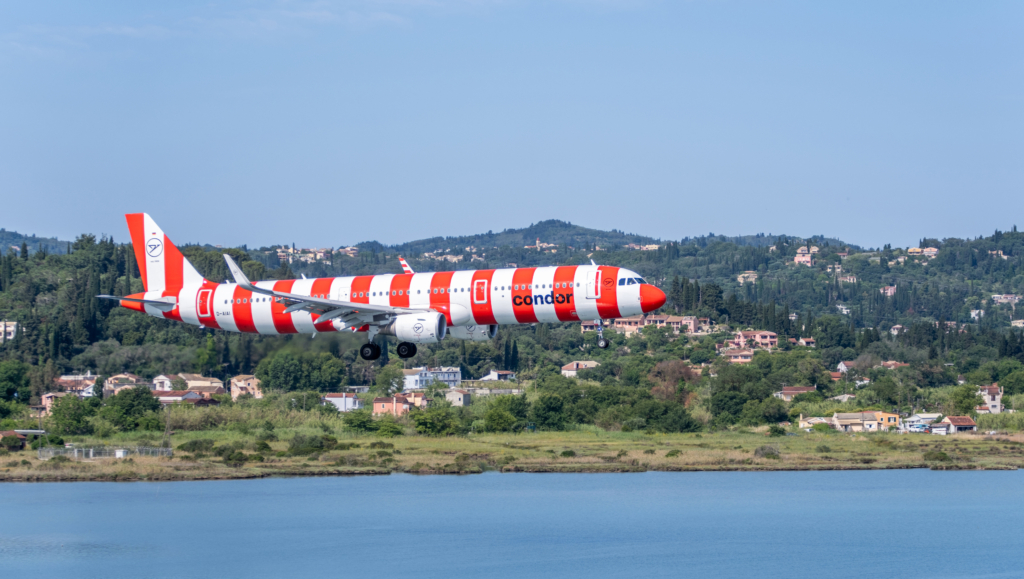 Condor Airbus A320 landing in front of a blue sky