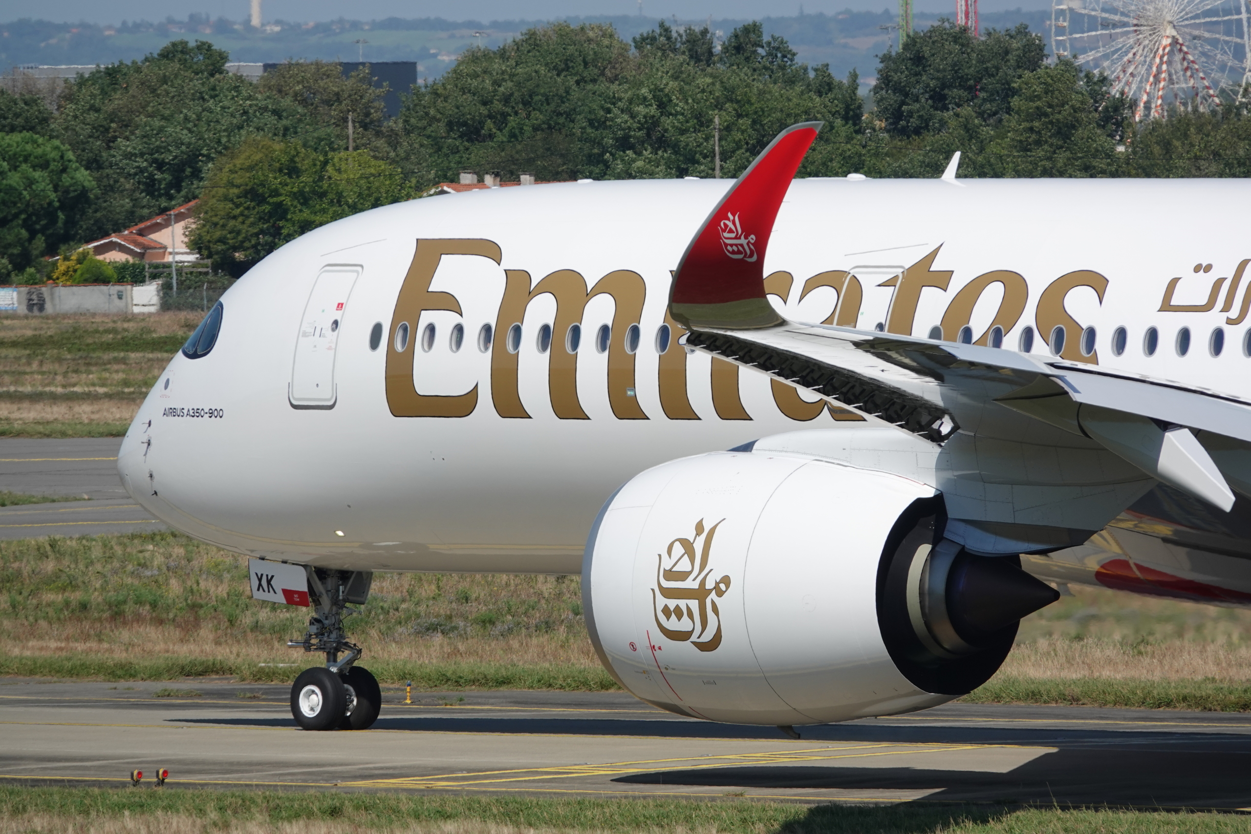 Emirates A350-900 taxiing on the tarmac