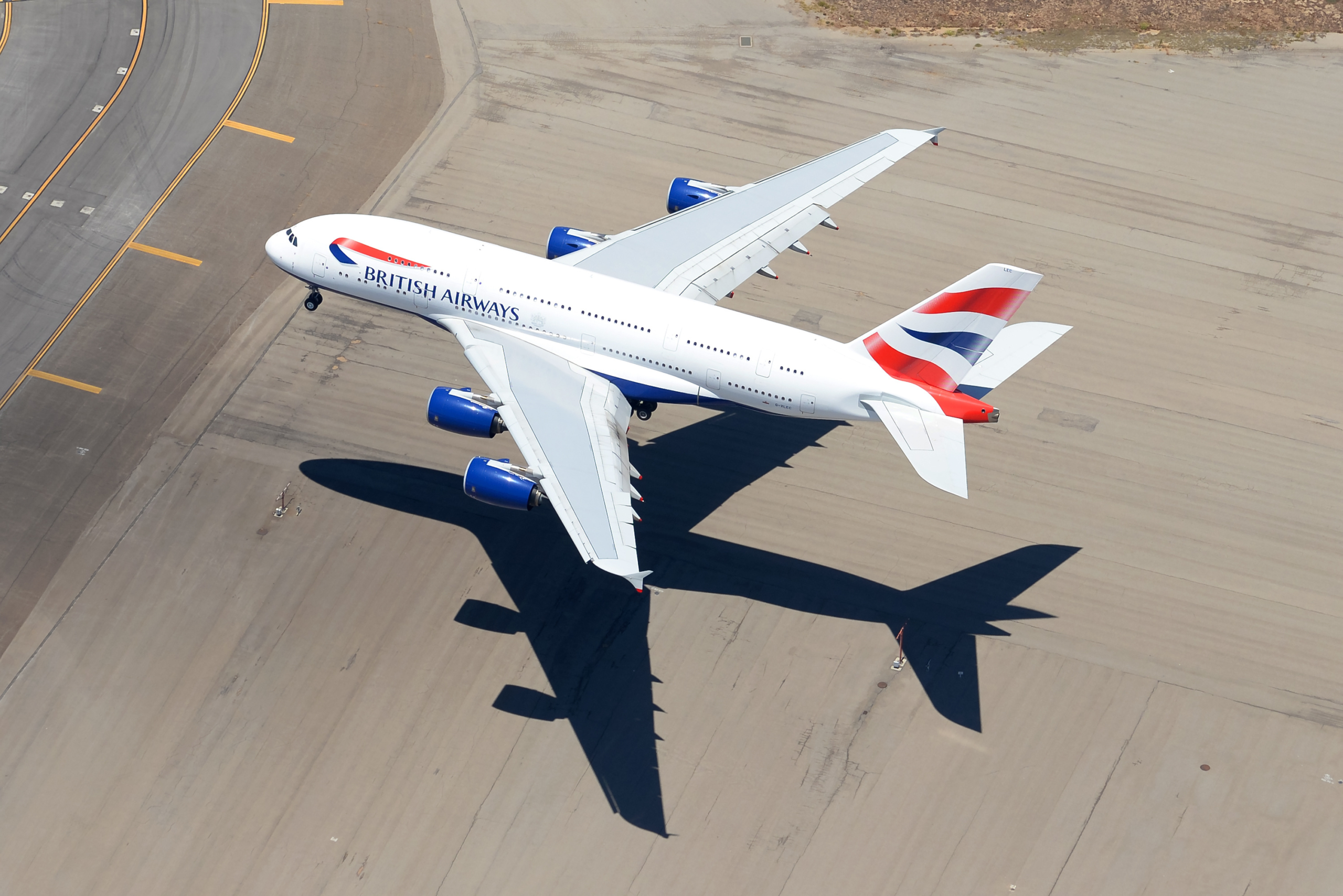 British Airways Airbus A380 airplane on final approach to LAX airport. Aerial view of A380-800 aircraft registered as G-XLEC.