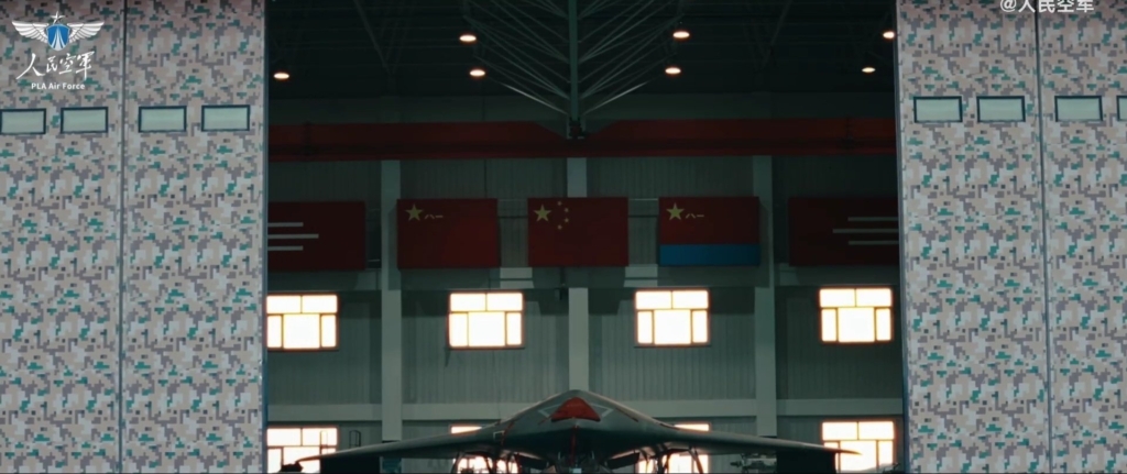 GJ-11 Sharp Sword Chinese UAVC drone emerging from the hangar