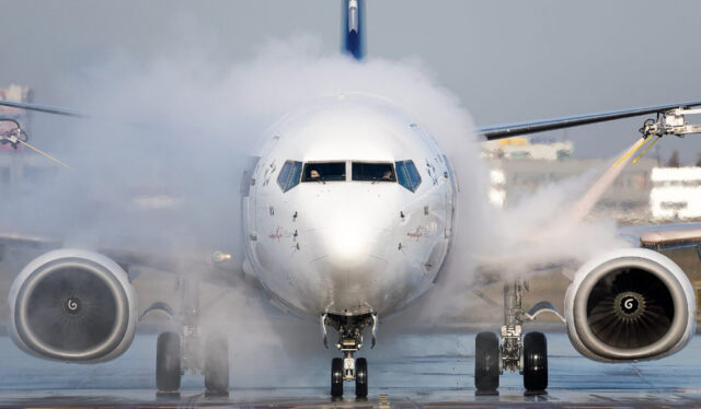 LOT Polish Airlines aircraft being de-iced