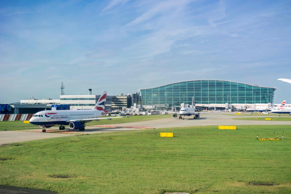London heathrow airport british airways aircraft taxiing at terminal 5