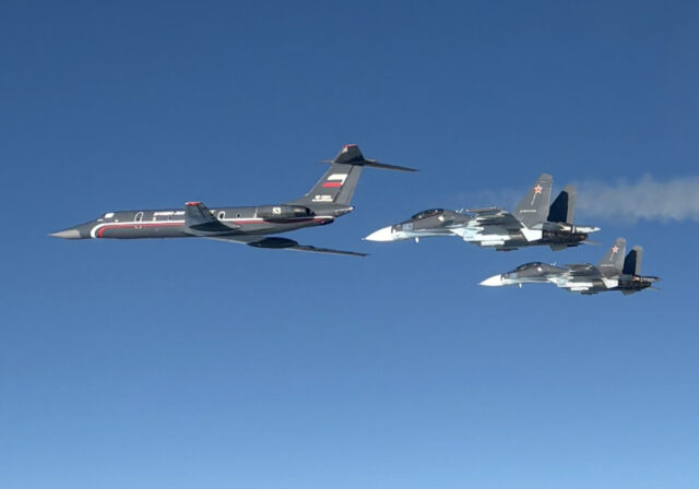 Russian Tu-134 with Su-30s