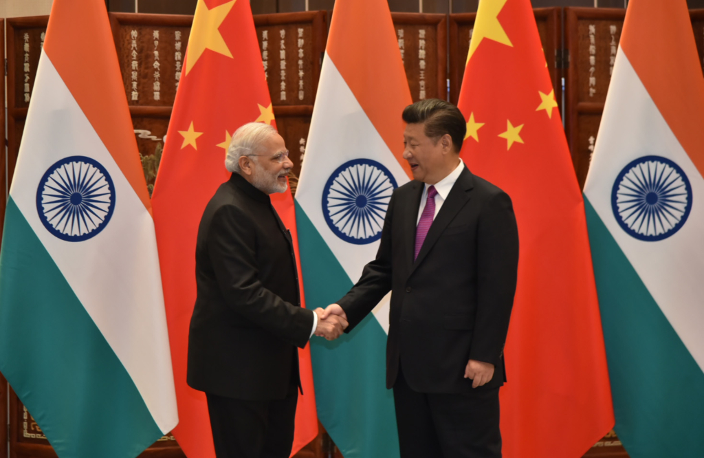 The Prime Minister, Shri Narendra Modi with the President of the People's Republic of China, Mr. Xi Jinping, during G20 Summit