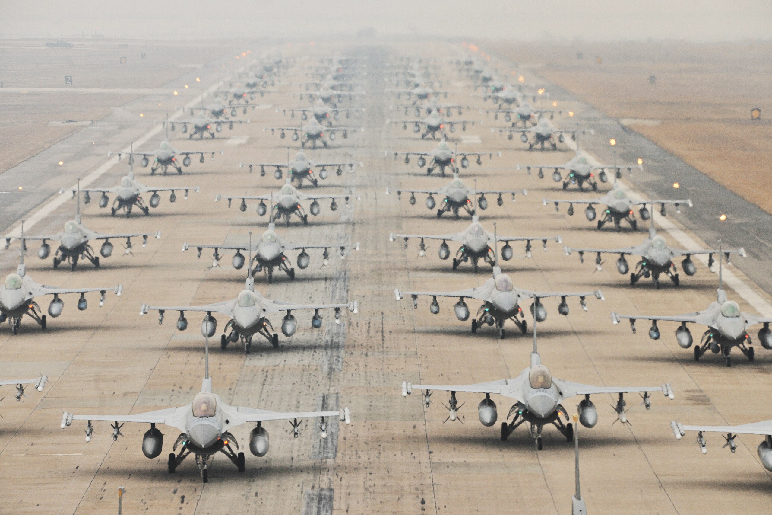 USAF and South Korean F-16 in an elephant walk at Kusan Air Base