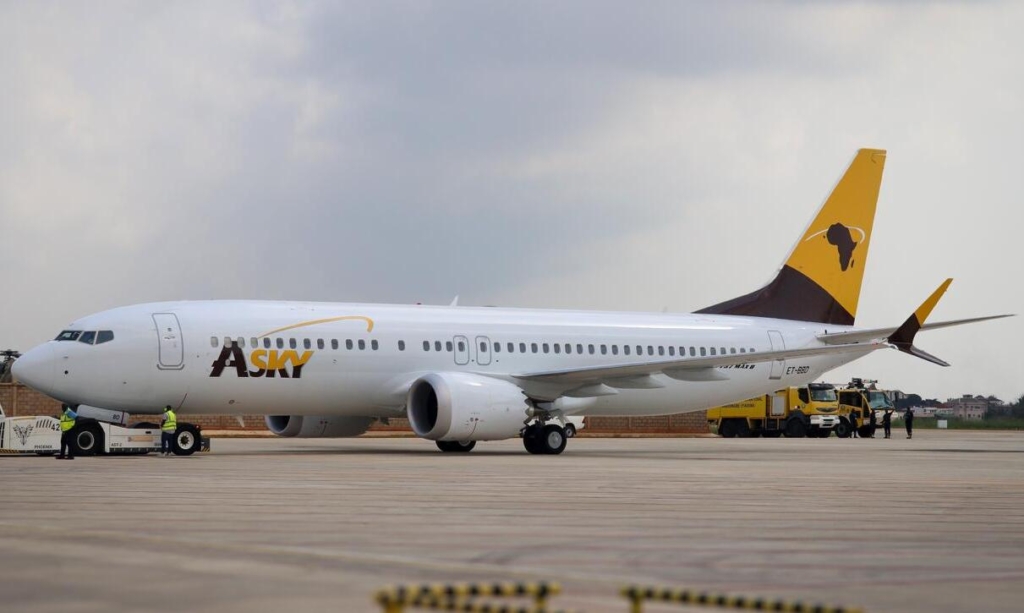 ASKY Boeing 737 MAX aircraft pictured stationary on the ground.