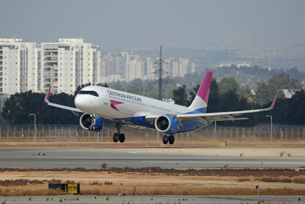 Ben Gurion, Israel – 2025.09.25: Centrum Air Airbus A321-253NX UK32131 take off with city skyline in the background