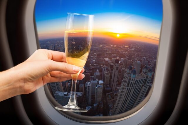 A champagne toast from an aircraft window.