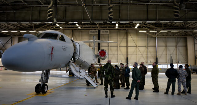 Military personnel from Ramstein AB, Germany, are given a tour of an EA-37B Compass Call during the new EW jet's first visit to Europe on 27 January 2026. Image: USAF/Senior Airman Edgar Grimaldo