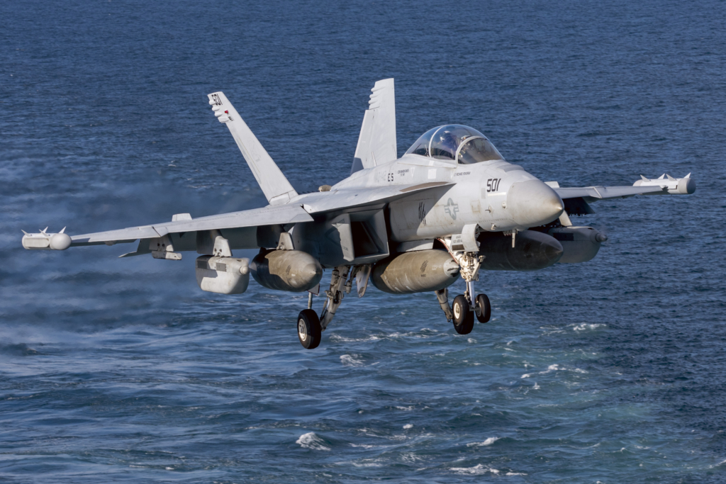 An EA-18G from VAQ-142 'Gray Wolves' prepares to land on the flight deck of USS Gerald R Ford during operations over the Norwegian Sea on 25 September 2025. Image: US Navy/Mass Communication Specialist Seaman Brianna Barnett