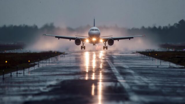 aircraft landing in the rain