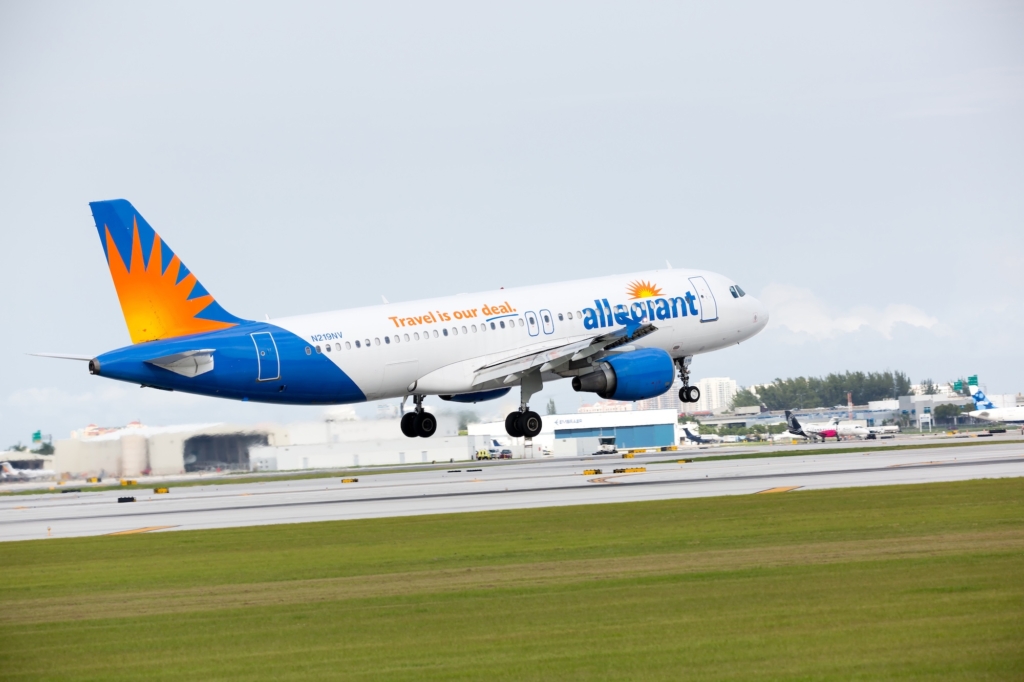 FORT LAUDERDALE, USA - JANUARY 26, 2016: An Allegiant Airlines Airbus A319 landing at the Fort Lauderdale/Hollywood International Airport.