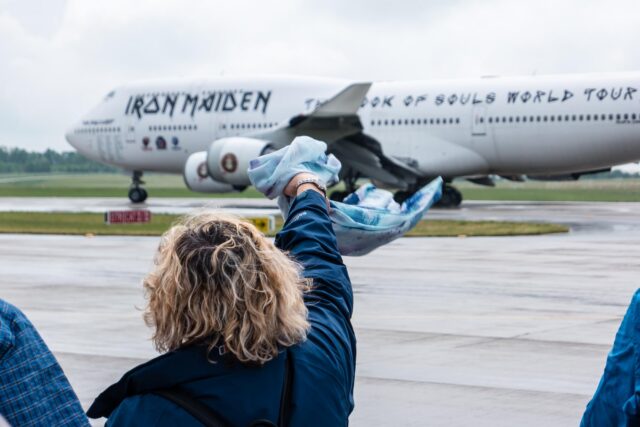 BERLIN, GERMANY - JUNE 01, 2016: A woman says goodbye to Iron Maiden's Boeing 747