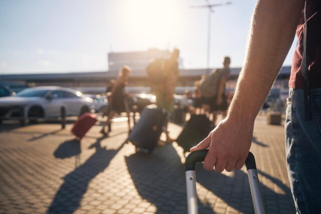 Airport parking passengers walking to terminal