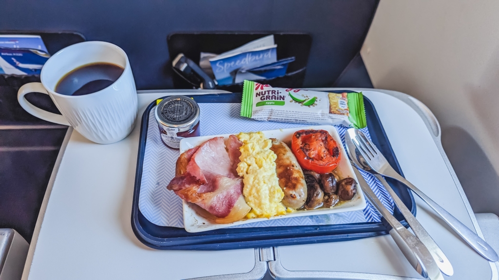Traditional English breakfast served with coffee on board a British Airways plane, business class.
