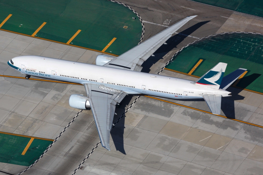 Cathay Boeing 777 with black stripes on wings