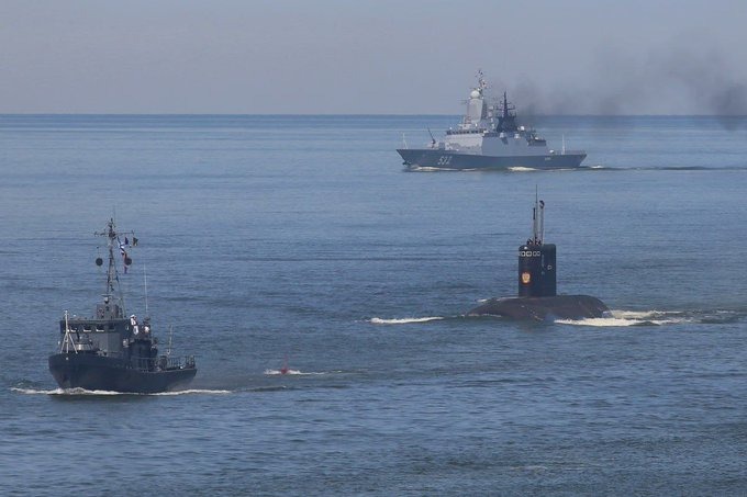Russian warships and submarines escort oil tanker