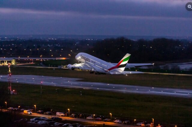 Emirates A380 taking off at night