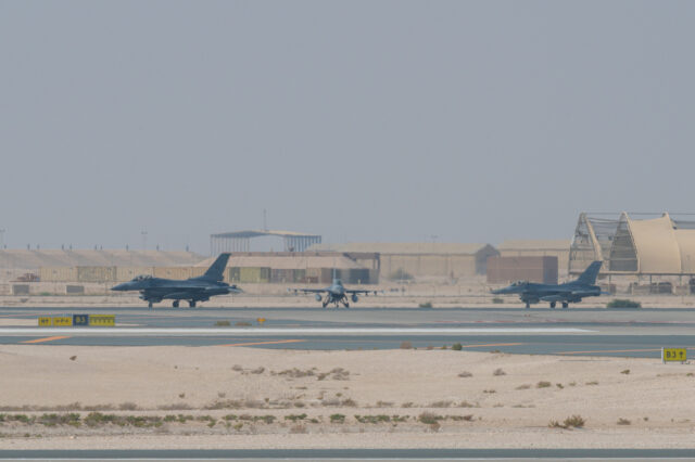 Three Air Force F-16 Fighting Falcon aircraft taxi in Qatar