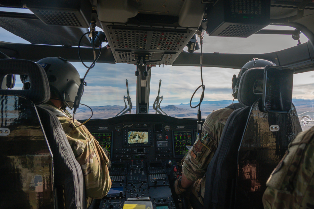 U.S. Air Force Capt. Michael White and Capt. Maxwell Turner, 40th Helicopter Squadron pilots