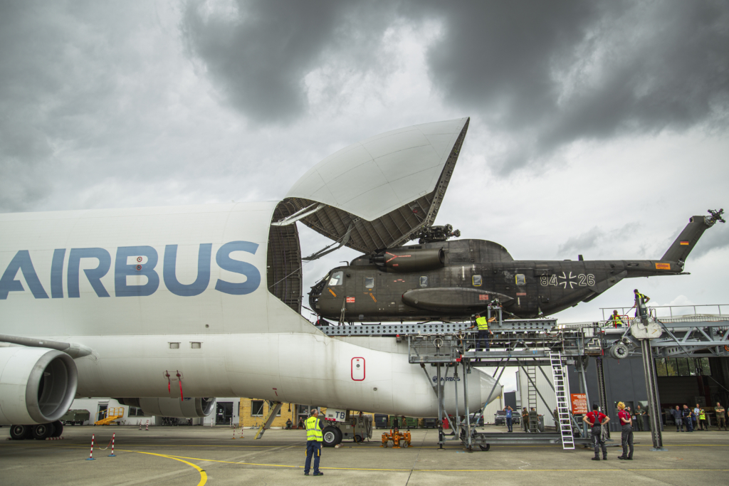 airbus beluga super transporter loading helicopter