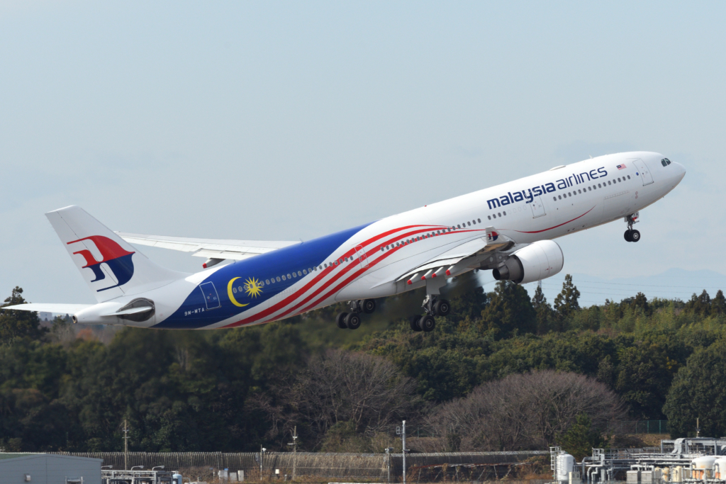 Chiba, Japan - December 19, 2020:Malaysia Airlines Airbus A330-300 (9M-MTA) passenger plane. Special livery "Negaraku" scheme.