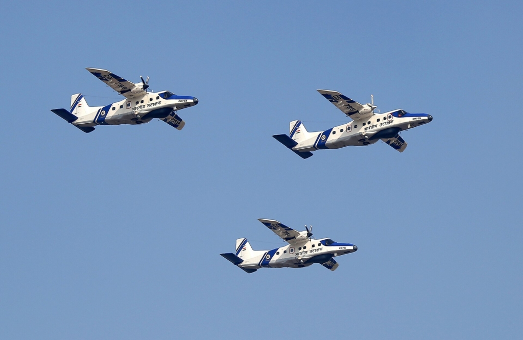 Glimpses of Air Show on the first day of the 15th Aero India in Bengaluru, Karnataka on February 10, 2025. The Indian Coast Guard fly in formation in a group of three Dornier Do 228 aircraft