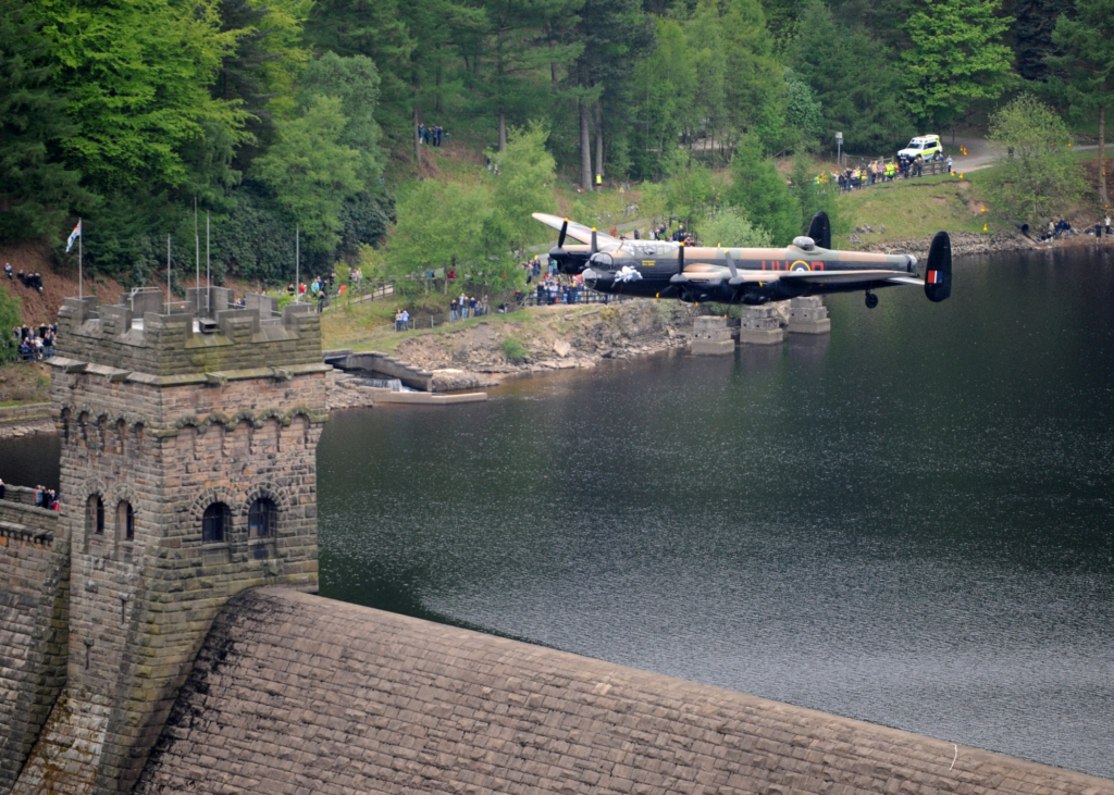 The Battle of Britain Memorial Flight's Avro Lancaster B.I (serial PA474) marks 65 years of the RAF's famed 'Dambusters Raid' by flying over Derwent Dam in the Peak District - which was used as a training location for Operation Chastise - on 16 May 2008. Image: MOD Crown Copyright/Sgt Graham Spark