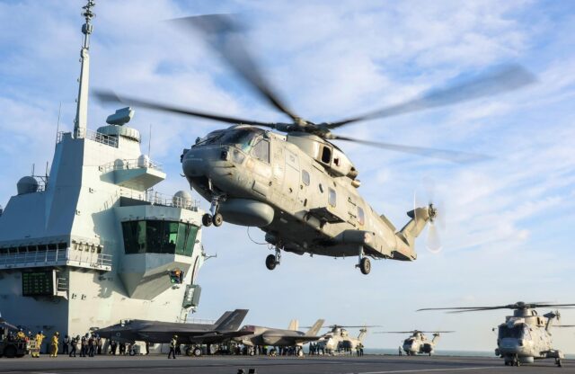 Merlin Mk2 Helicopter takes off from the flight deck of HMS Queen Elizabeth