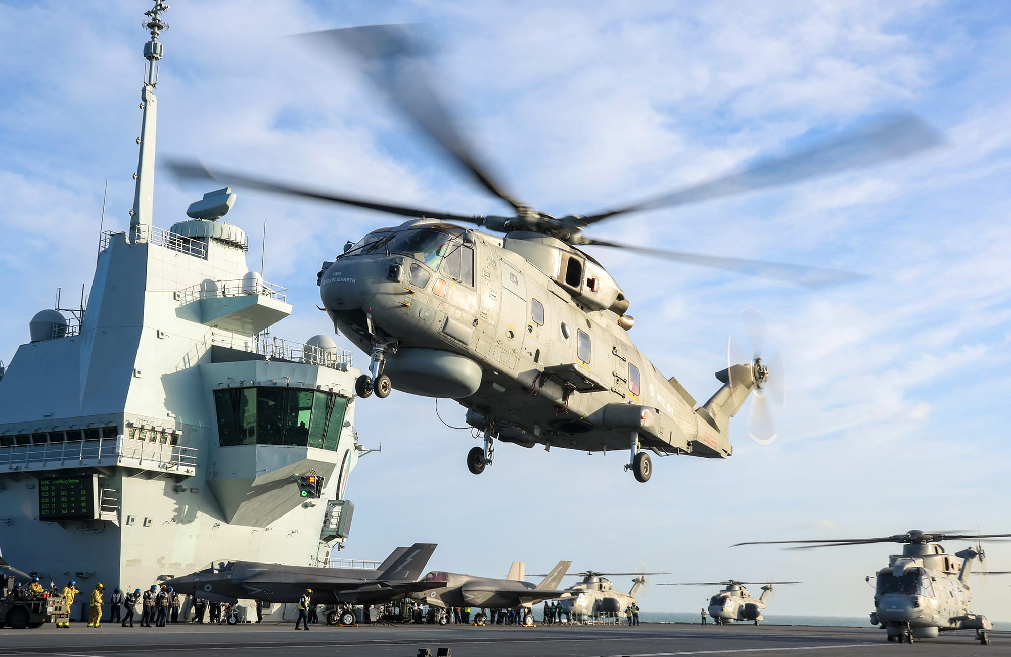 Merlin Mk2 Helicopter takes off from the flight deck of HMS Queen Elizabeth