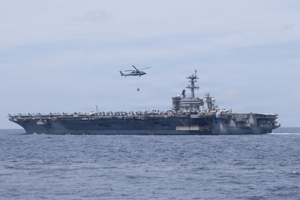 USS Abraham Lincoln (CVN-72) conducts a vertical replenishment (VERTREP) operation in the South China Sea on 17 January 2026, shortly before CSG-3 was retasked to the Middle East Image: US Navy/Mass Communication Specialist 2nd Class Jordan Steis