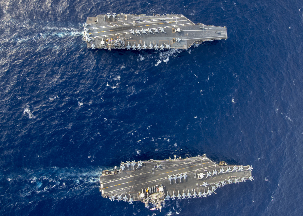 The US Navy's first-in-class USS Gerald R Ford (CVN-78) sails in formation with the Nimitz-class 'flattop', USS Harry S Truman (CVN-75), in the Atlantic Ocean on 4 June 2020. Image: US Navy/Mass Communication Specialist Seaman Riley McDowell