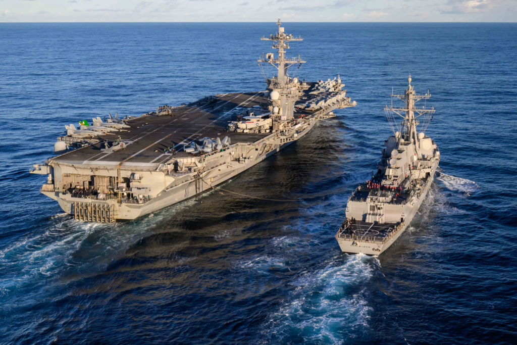 USS Theodore Roosevelt undergoes a refuelling-at-sea operation with the Arleigh Burke-class guided-missile destroyer, USS Carl M Levin (DDG-120), in the Pacific Ocean on 16 November 2025. Image: US Navy/Mass Communication Specialist 3rd Class Aaron Haro Gonzalez